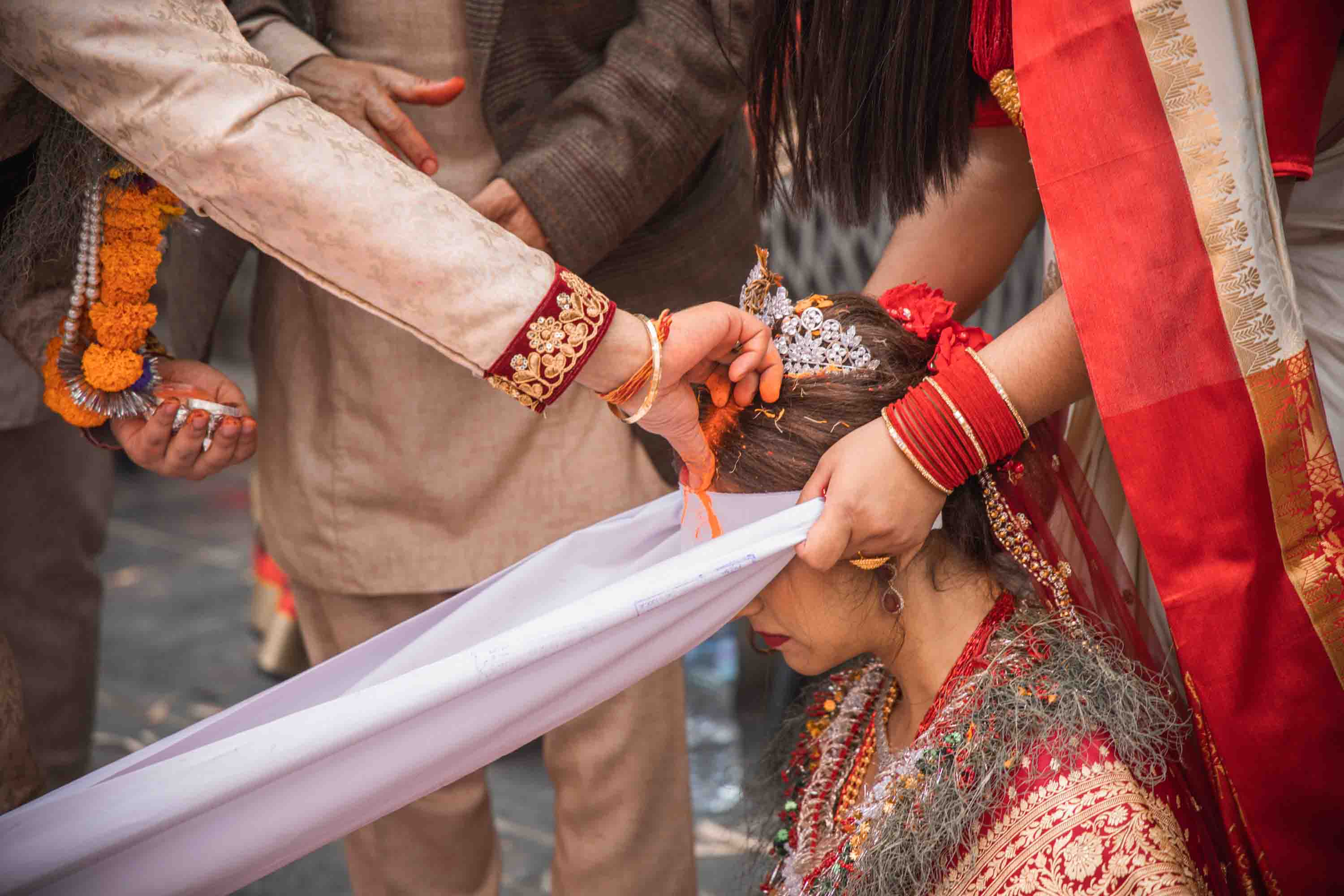 Couple in traditional attire during an elegant wedding photoshoot